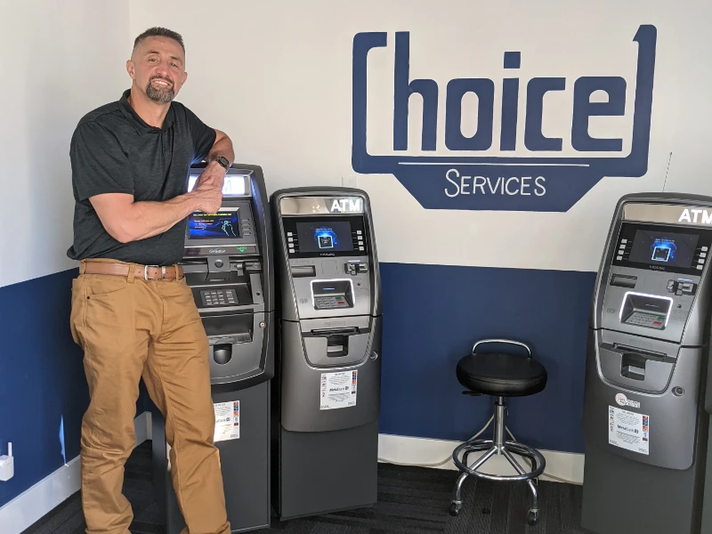 The Owner of Choice 1 Services in his ATM Showroom